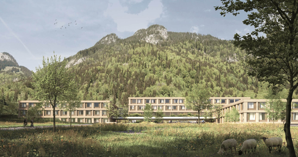 Leitspital Liezen: Drei behutsam in die Landschaft eingebettete Baukörper